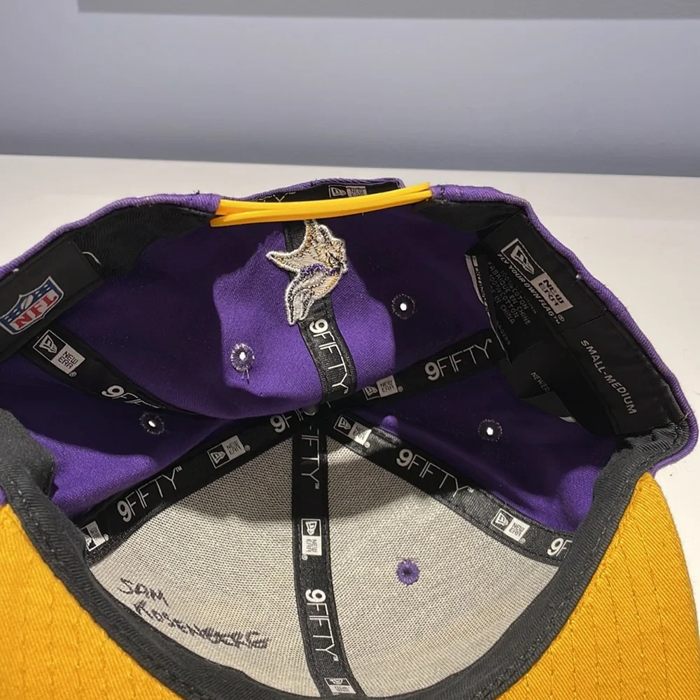 New Era Minnesota Vikings SnapBack Baseball Hat.